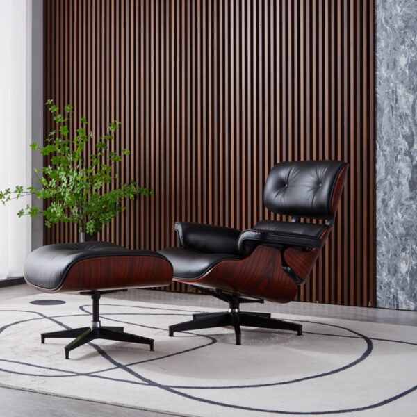 replica fauteuil lounge eames et ottoman en cuir noir et bois de rose dans un salon avec tapis blanc